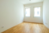 Bild - Charmante 2-Zimmer Wohnung mit Balkon und Fußbodenheizung im 4. Bezirk Wien!